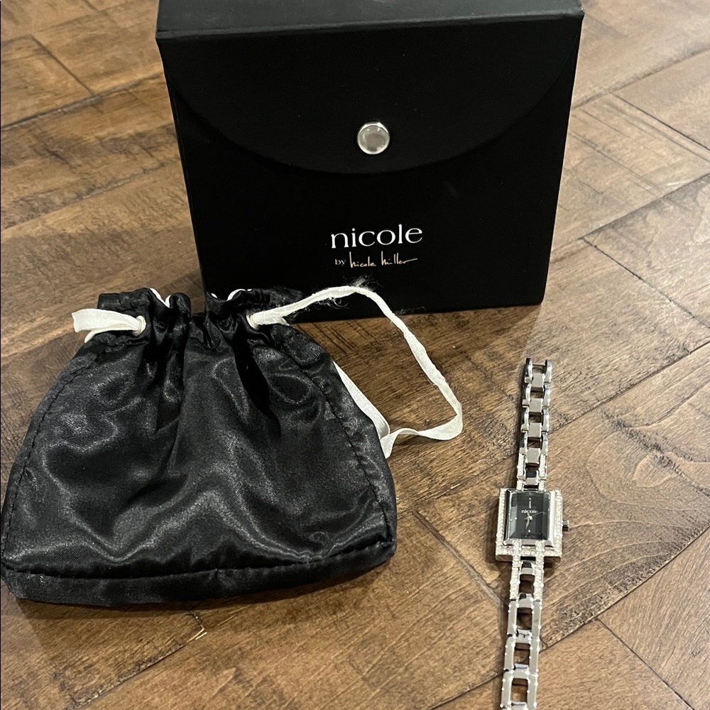 Nicole Miller silver watch with rhinestones